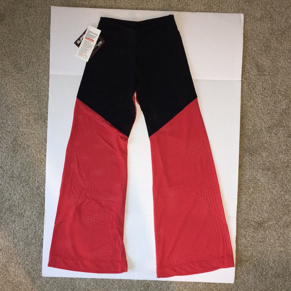 NWT Zumba Yoga pants retro look from 70’s vibe. Black and red color block.